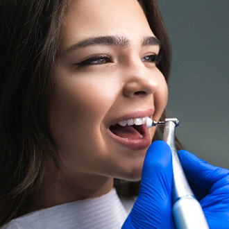 A woman getting a dental cleaning