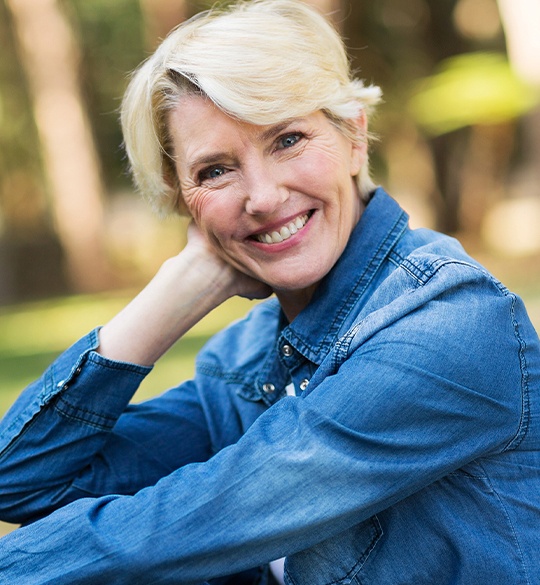 Smiling older woman outdoors