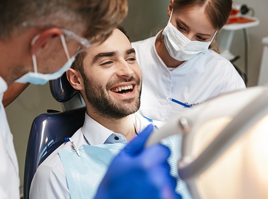 Patient smiling at dental visit