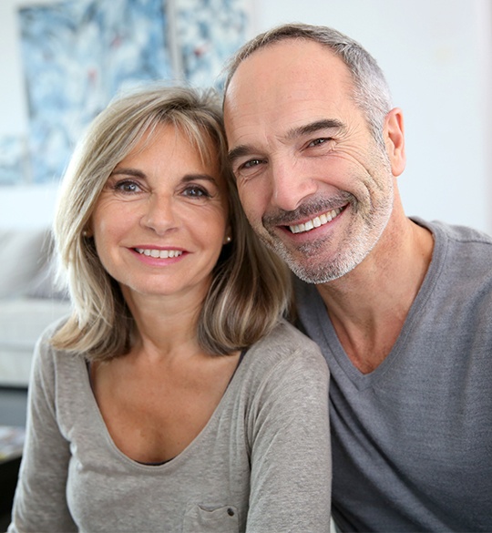 Smiling older man and woman