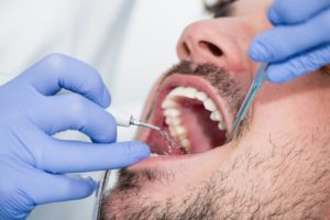 man at dental visit in Parma Heights