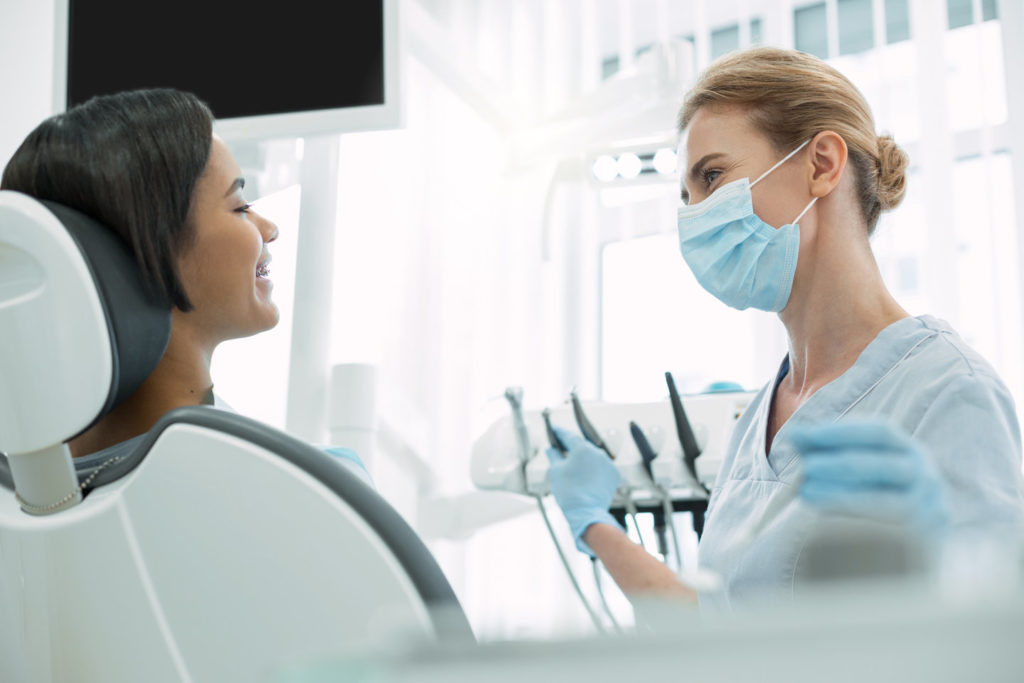 Dentist in Parma Heights uses protective equipment.