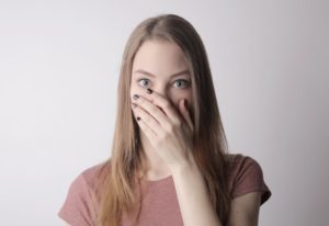 Woman embarrassed at the dentist in Middleburg Heights.